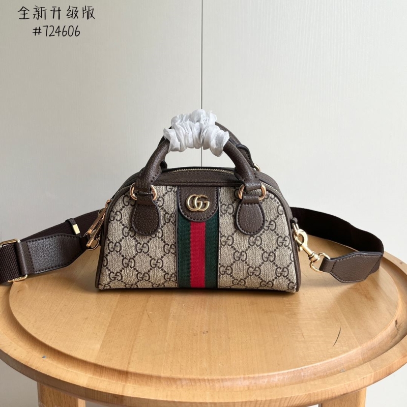 G*u*i top handle bags